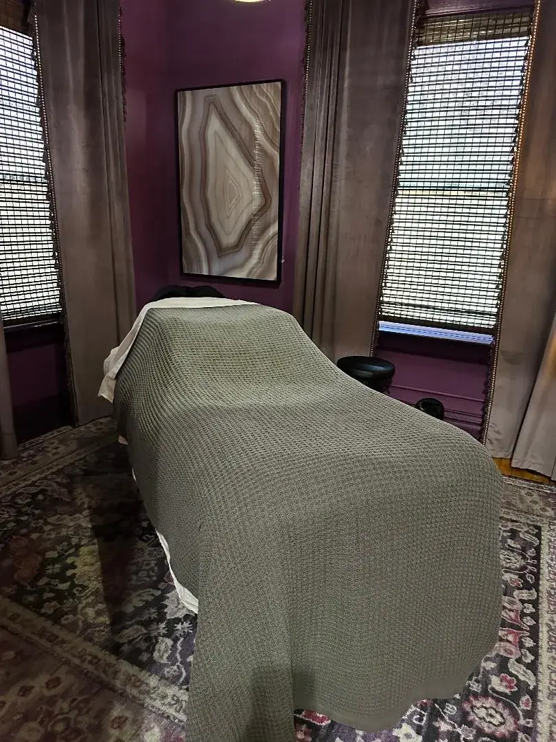 Massage table in cozy spa room